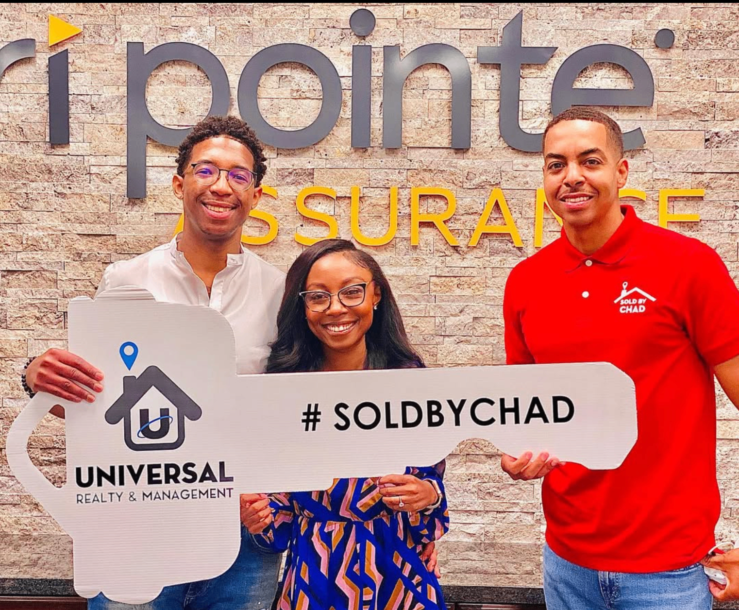 Buyers celebrating with Chad at closing
